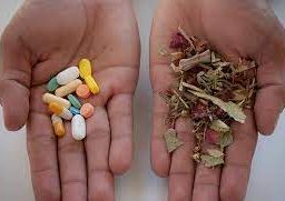 Comparison between herbs and tablets, illustrating traditional and pharmaceutical medication choices.