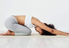 Woman Practicing Relaxation Exercises: Promoting Stress Relief and Well-Being