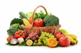 A colorful assortment of fruits and vegetables, showcasing items like bananas, tomatoes, and broccoli.