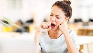 A tired person experiencing fatigue