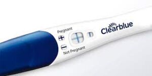 An image of a clear positive pregnancy test showing two distinct lines on the result window. The test device is placed on a clean, neutral surface, emphasizing the result for clarity.