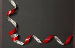 Measuring genetic factors: Tape measure symbolizing the precision in understanding genetic influences.