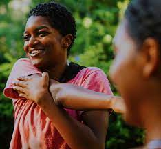 Person performing light stretching exercises of the arm