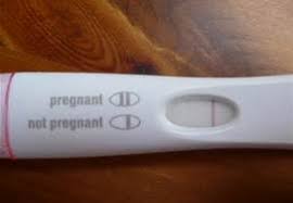 An image of a pregnancy test displaying a negative result, with a single visible line in the test window. The test is placed on a clean surface, with clear markings indicating the result. 