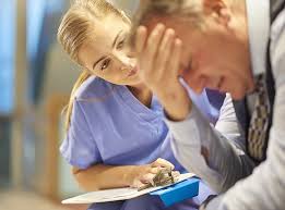 Nurse demonstrating empathy and compassion with a patient by providing comforting care and emotional support to a patient in need