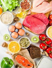 Endometriosis diet essentials: Vibrant healthy food items displayed on a countertop for hormone balance and well-being. 