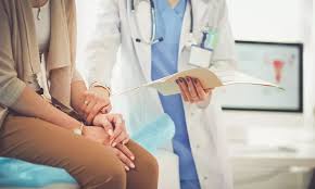 Woman consulting with healthcare professional