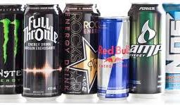 Assorted energy drinks on display, showcasing popular brands and options.