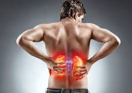Man experiencing back pain, a symptom of kidney disease