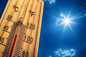 A thermometer measuring over 100 degrees Fahrenheit under the blazing sun: Illustrating the intensity of heatwaves.