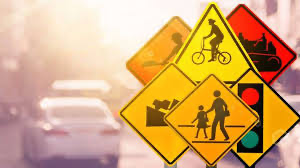 Assorted road traffic signs: A variety of signs guide drivers, ensuring safe navigation on the roads.