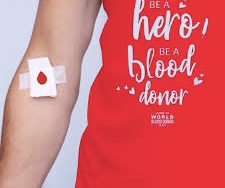 A person proudly wears a t-shirt commemorating their donation of blood after completing the noble act. This gesture symbolizes their contribution to saving lives and supporting healthcare initiatives.
