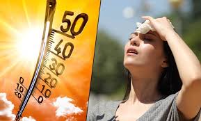 Hot person wiping their face blazing in the sun: Illustrating the intensity of heat from the sun 