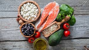 Omega-3 Rich Foods - Explore this image featuring fatty fish like salmon, chia seeds, and flaxseeds, promoting these sources for a diet supportive of PCOS and overall health