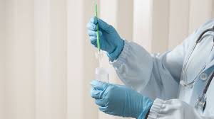 Healthcare professional conducting a pap smear screenings test