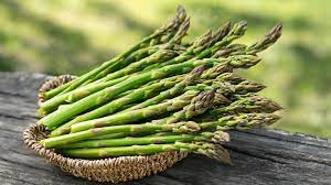 Asparagus, rich in folate and prebiotic fibers, supporting energy production and digestive health.