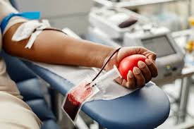 Individual person donating blood, exemplifying the selfless act of giving and its vital role in healthcare.